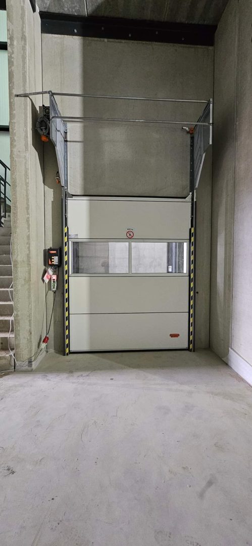 Compact elevator door with transparent panel
