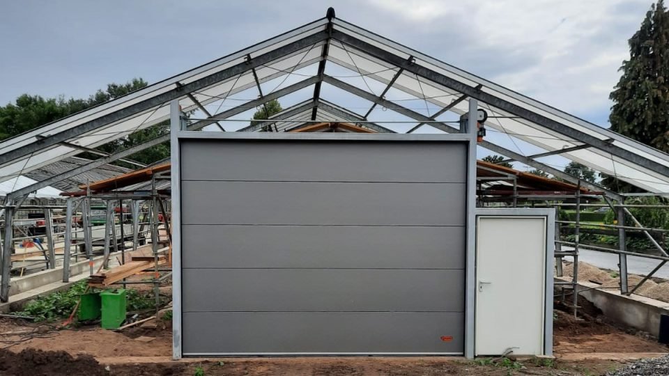 Sectional doors for agriculture